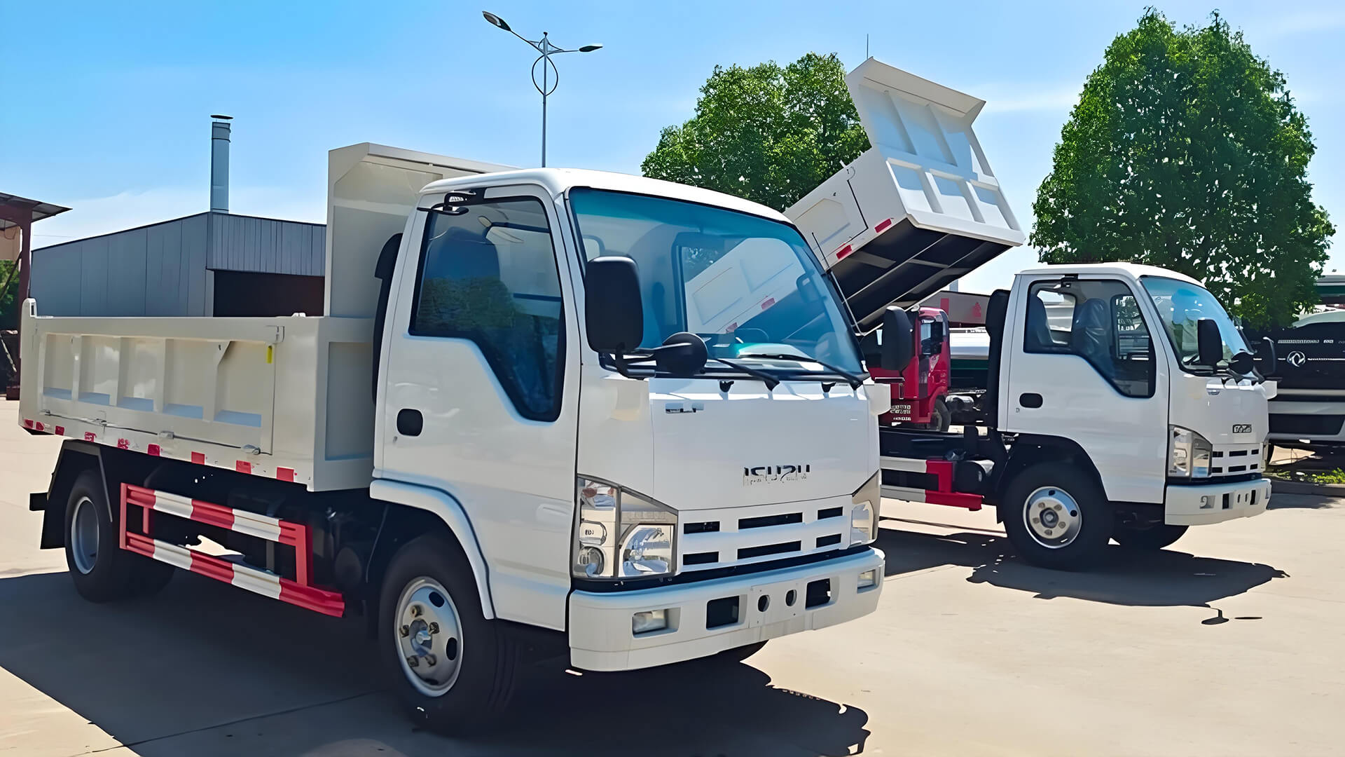 To Angola-2 units of ISUZU 100P dump trucks